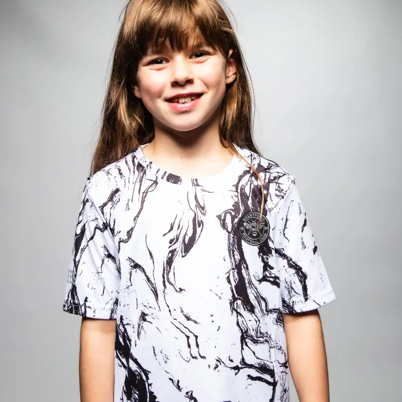 Brentford Junior Marble Poly Tee-2400011 Brentford Jersey Collection - Shop Football Kits & Shoes Brentford Junior Marble Poly Tee-2400011 Brentford Jersey Collection - Shop Football Kits & Shoes